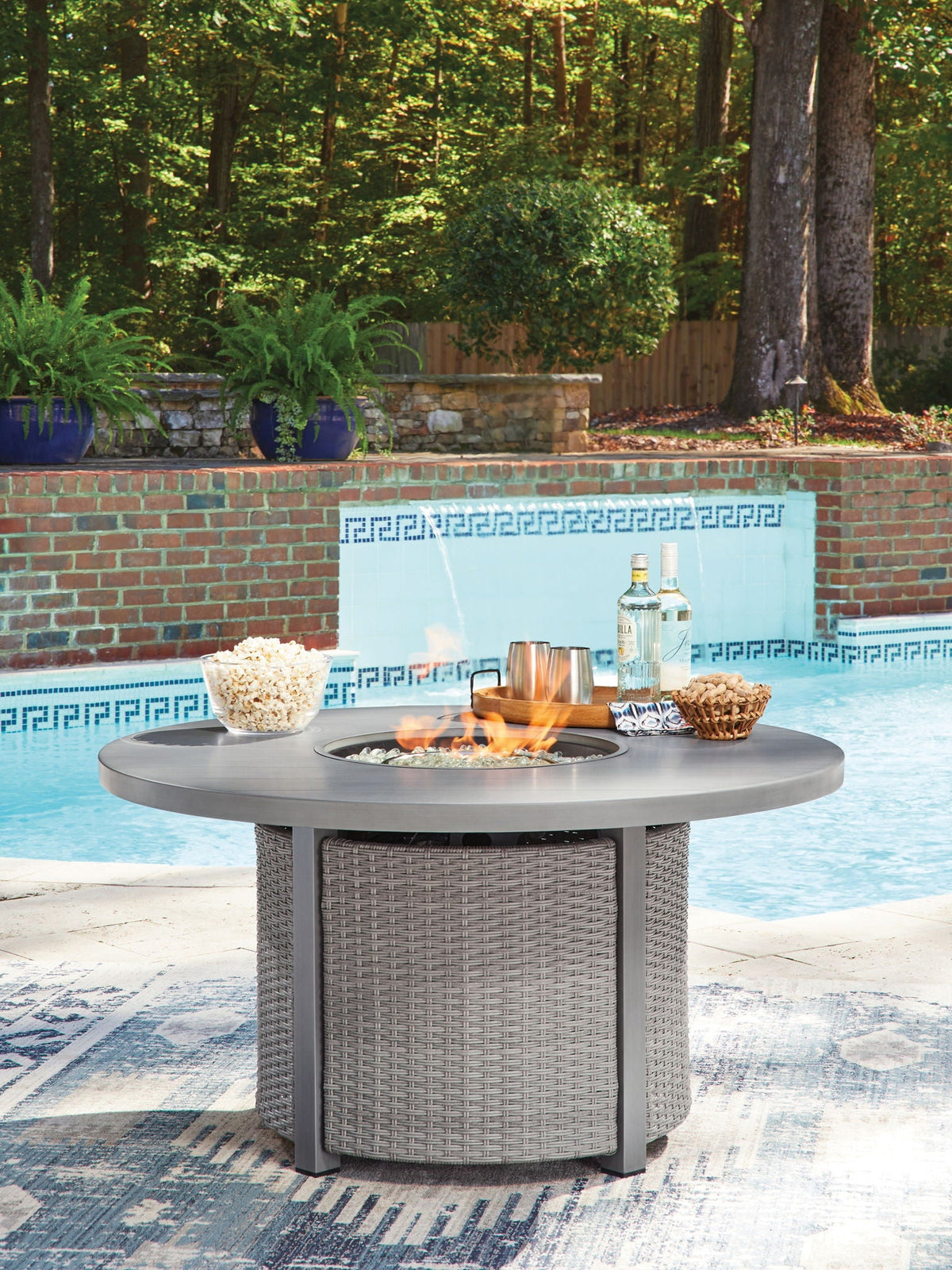 Half Moon Beach - Round Fire Pit Table - Gray - Select Living Furniture - Fire Pits - Signature Design by Ashley® - PCP418-776 - Half Moon Beach - Round Fire Pit Table - Gray -