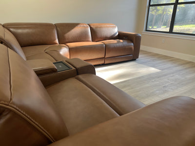 Customer photo of brown leather Rally-Up sectional in a home living room