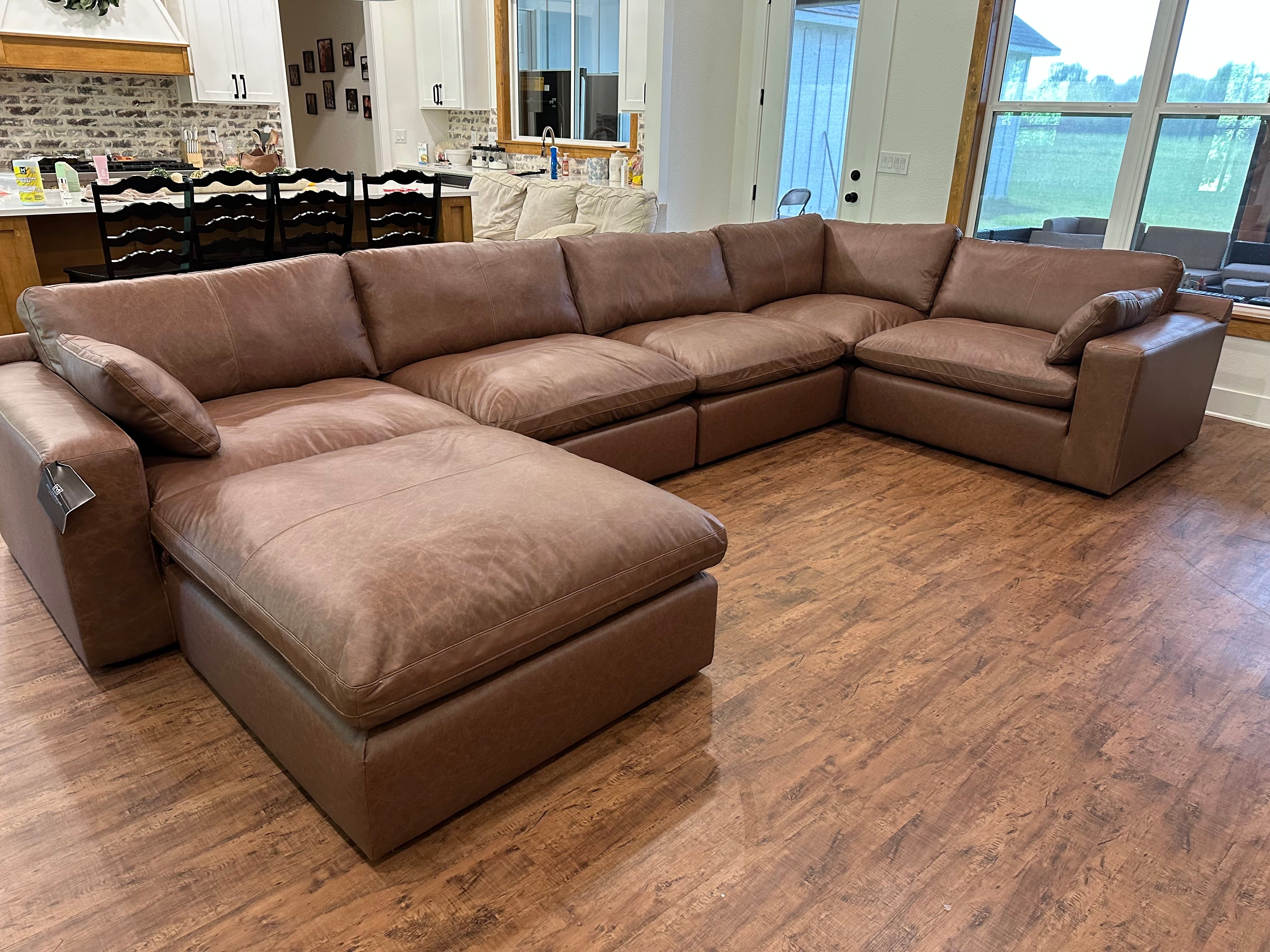 Caramel Milano sectional in a bright living room