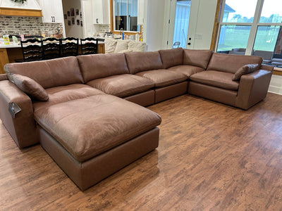 Emilia Modular Leather Sectional displayed in a customer living room