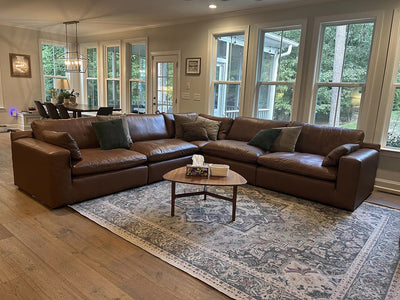 Emilia leather sectional photographed in a real customer home