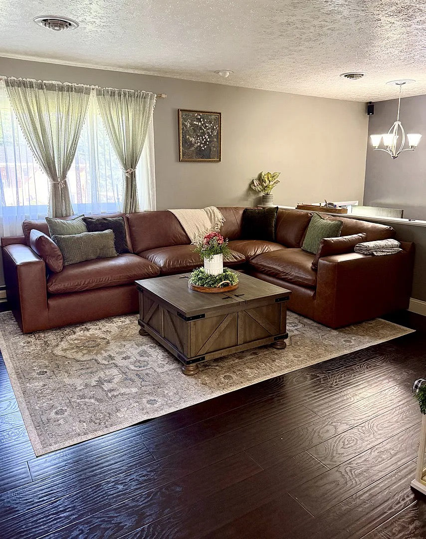 Caramel Milano sectional in a modern living room